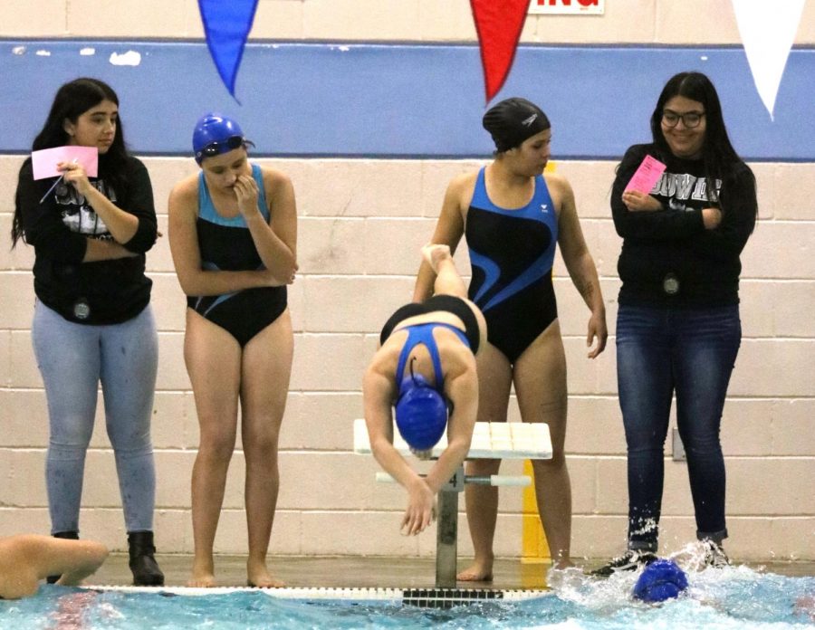 Girls swimming members overcome challenges, build family bond
