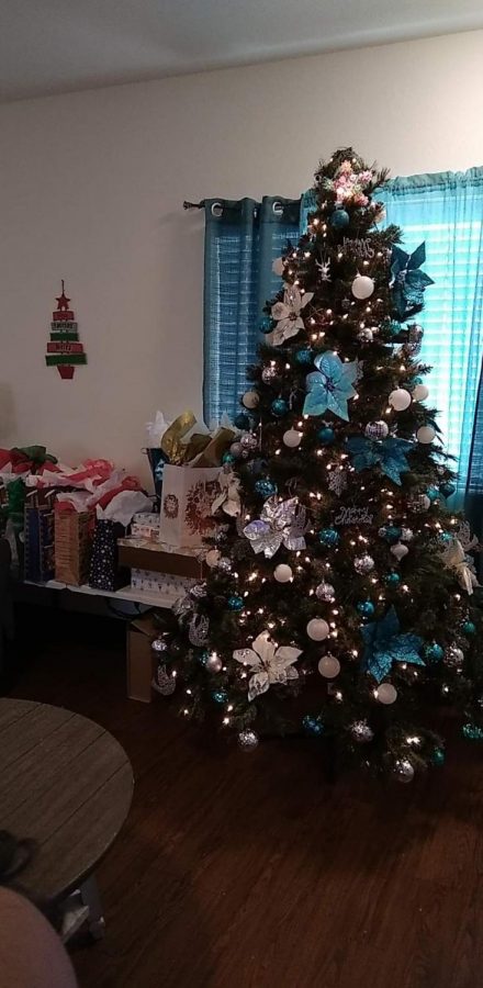 Picture taken in my house on December 12, 2021 showing Christmas tree and gifts 
